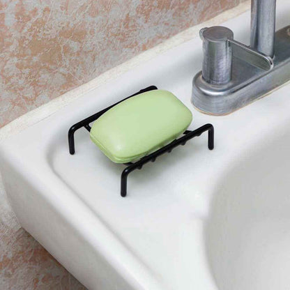 Soporte en color negro para jabón o esponja para lavadero de baño