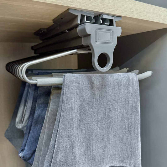 Pantalonera extraíble de 10 brazos con pantalones colgados dentro del armario